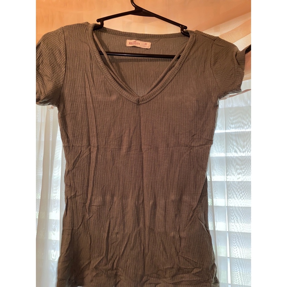 A navy green hollister shirt